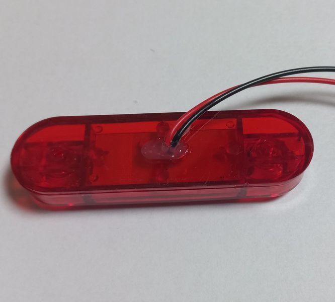 Ліхтар габаритний 12/24 маркерний червоний 87х25мм 9 LED (AutoLight) 397734 фото
