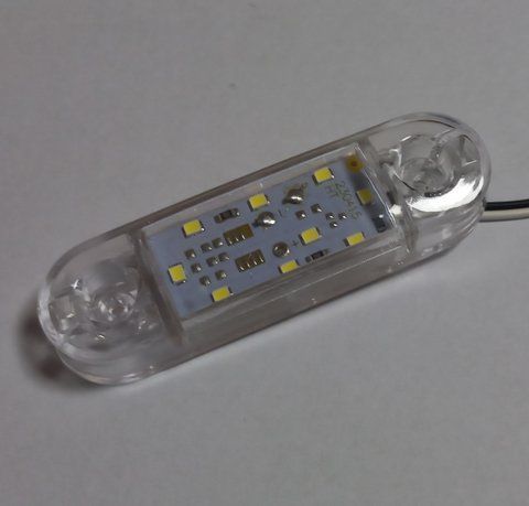 Ліхтар габаритний 12/24 маркерний білий 87х25мм 9 LED (AutoLight) 397733 фото